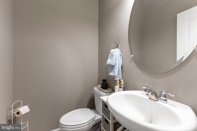 12831 Clarksburg Square Rd, Clarksburg, MD 20871 - half bathroom with a sink and toilet