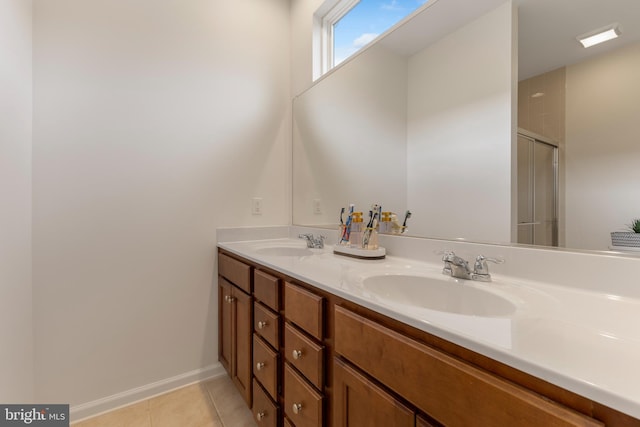 12831 Clarksburg Square Rd, Clarksburg, MD 20871 - bathroom featuring a stall shower, double vanity, a sink, and tile patterned flooring