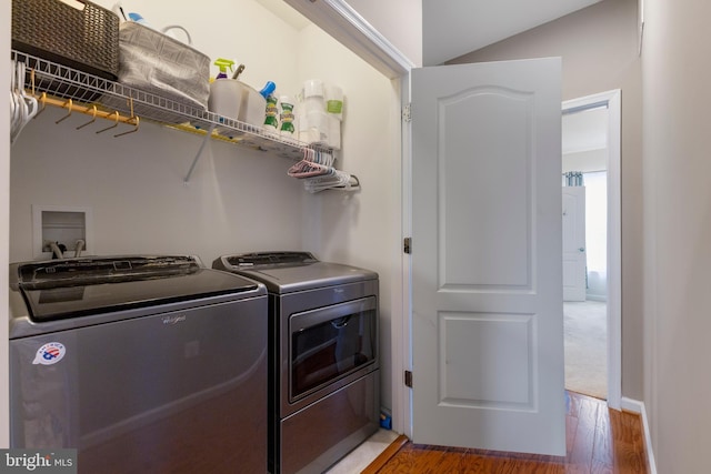 12831 Clarksburg Square Rd, Clarksburg, MD 20871 - laundry room with light wood finished floors, laundry area, and washing machine and clothes dryer
