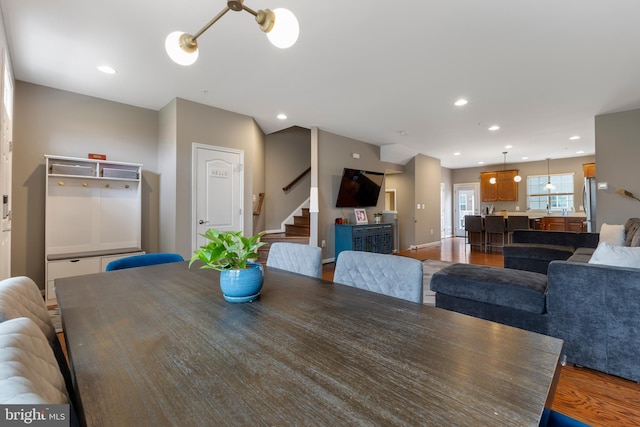 12831 Clarksburg Square Rd, Clarksburg, MD 20871 - dining room with wood finished floors, recessed lighting, baseboards, and stairs