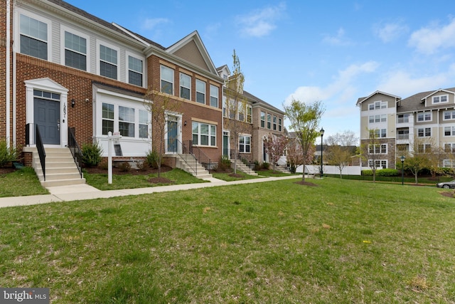 12831 Clarksburg Square Rd, Clarksburg, MD 20871 - multi unit property with a residential view, a front lawn, and brick siding