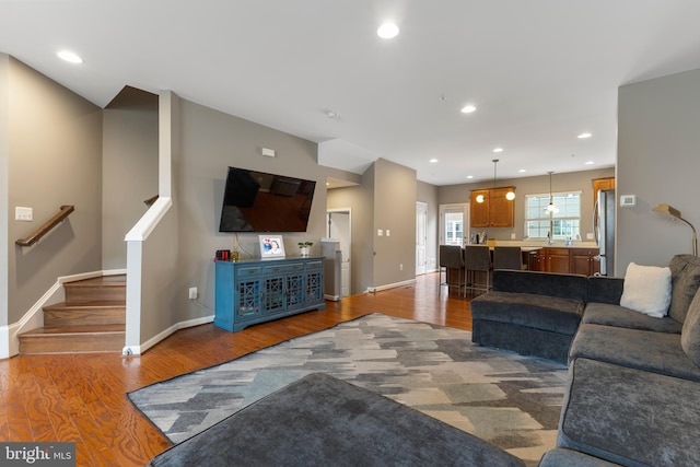 12831 Clarksburg Square Rd, Clarksburg, MD 20871 - living room with stairs, baseboards, and wood finished floors