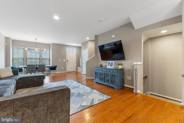 12831 Clarksburg Square Rd, Clarksburg, MD 20871 - living area with wood finished floors, baseboards, and recessed lighting