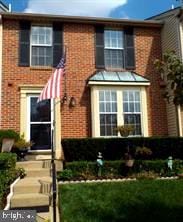 view of front of house with brick siding