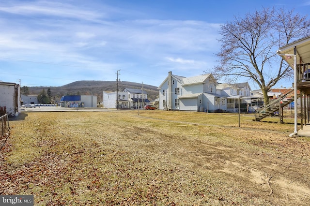 view of yard with a residential view