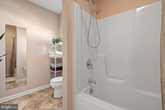 full bath featuring baseboards, toilet, and shower / bath combination with curtain