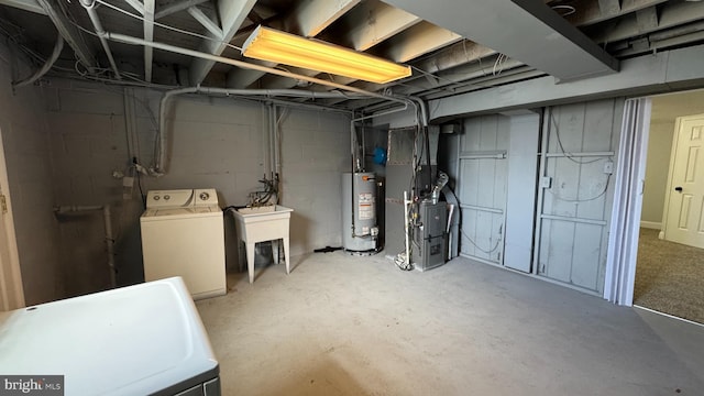 unfinished basement with washer / dryer, heating unit, and water heater