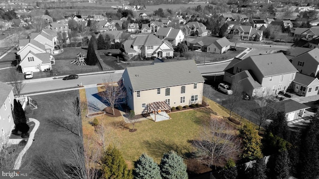 birds eye view of property with a residential view