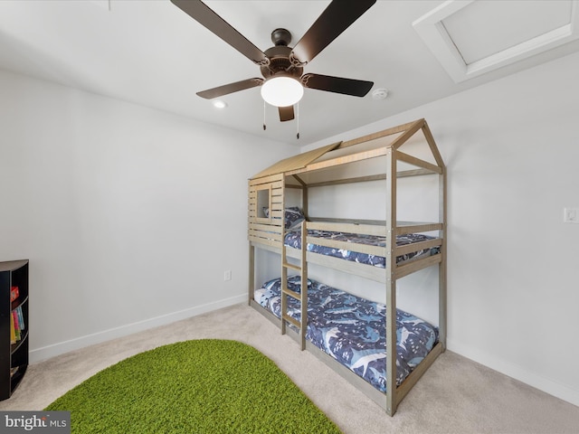 carpeted bedroom featuring attic access, recessed lighting, a ceiling fan, and baseboards