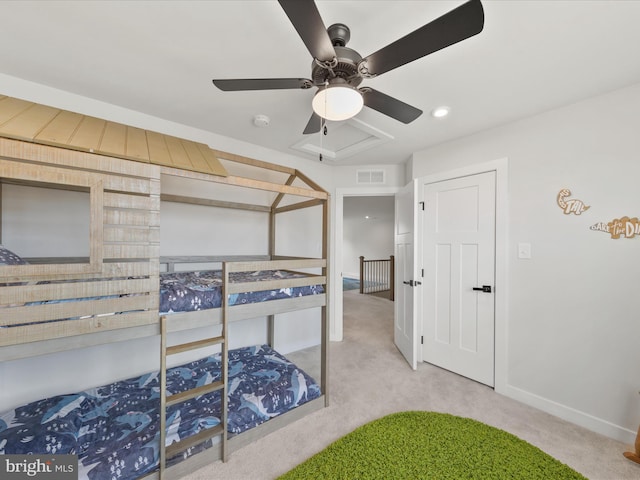 carpeted bedroom with visible vents and baseboards