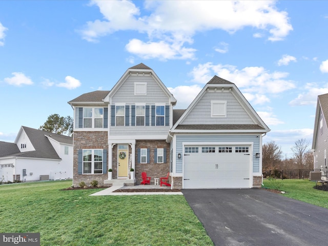 view of front of property featuring a front lawn, aphalt driveway, cooling unit, stone siding, and an attached garage