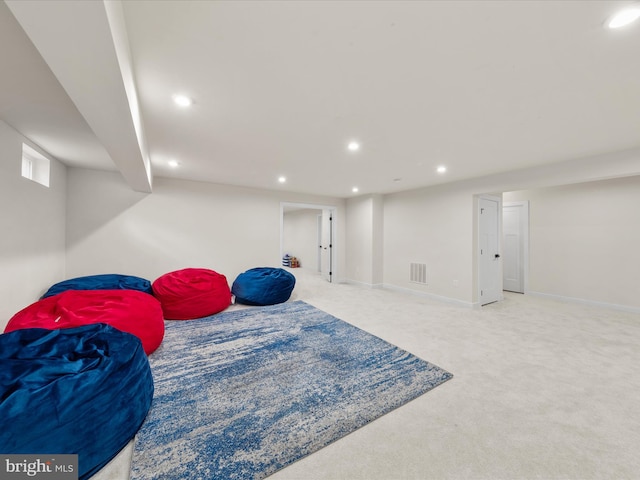 exercise area featuring recessed lighting, visible vents, baseboards, and carpet flooring