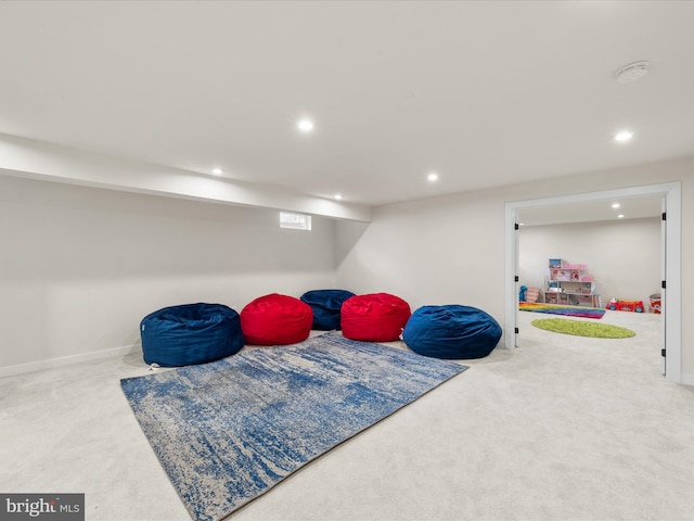 recreation room with carpet flooring, recessed lighting, and baseboards