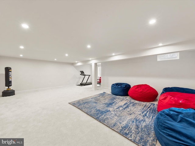 living area with carpet flooring, recessed lighting, and baseboards