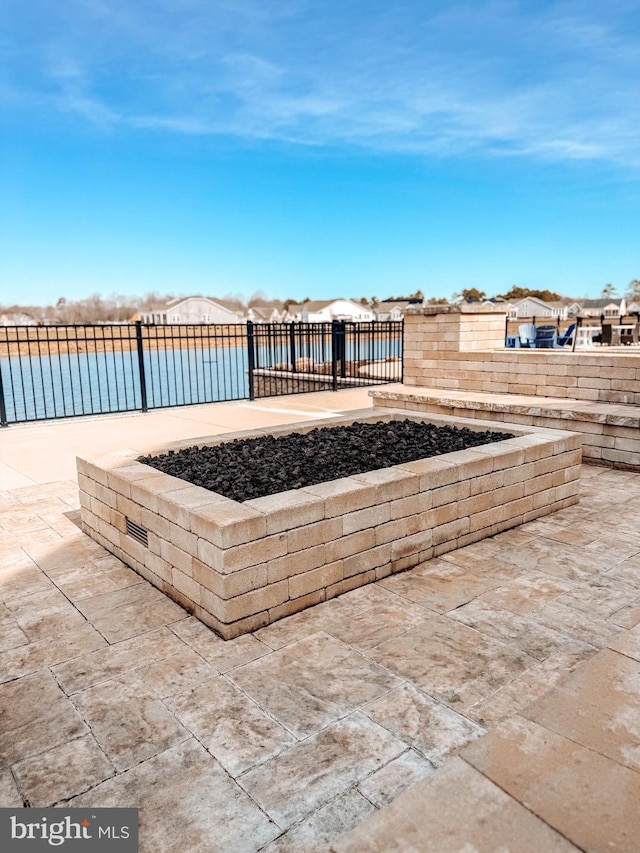 view of patio featuring fence