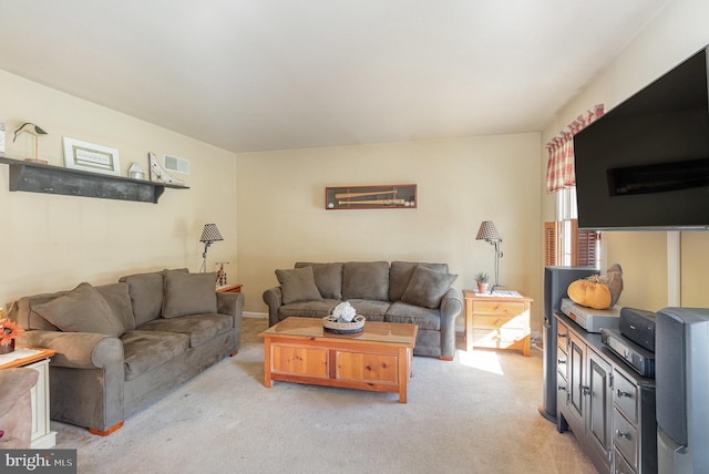 living room with light carpet and visible vents