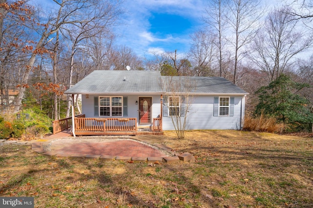 ranch-style home featuring covered porch