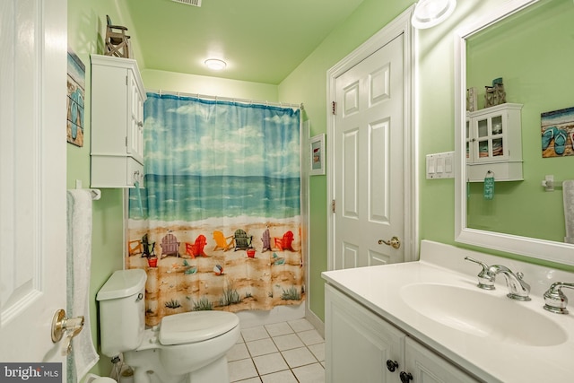 full bath with tile patterned flooring, a shower with curtain, toilet, and vanity