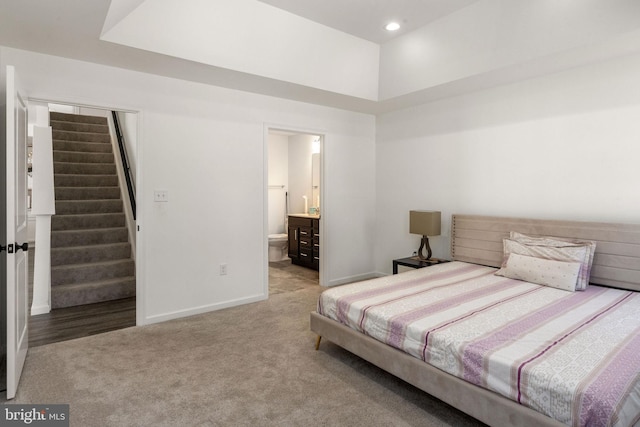 bedroom featuring recessed lighting, baseboards, and carpet