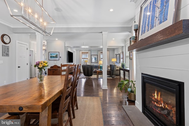 631 Monument Ave, Malvern, PA 19355 - dining area featuring hardwood / wood-style floors, ornate columns, recessed lighting, a glass covered fireplace, and crown molding