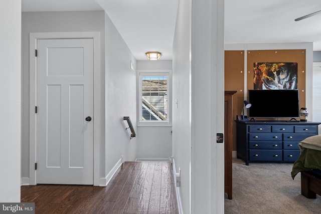631 Monument Ave, Malvern, PA 19355 - hallway featuring an upstairs landing, baseboards, and wood finished floors