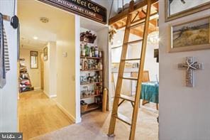 hallway featuring wood finished floors