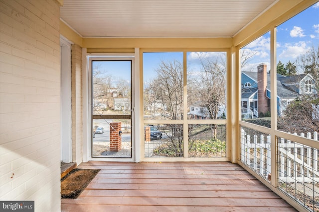 sunroom / solarium featuring plenty of natural light