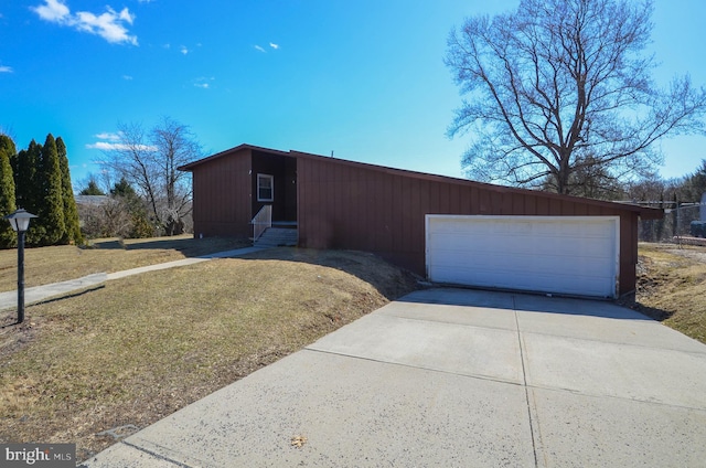 view of front facade with a garage and entry steps