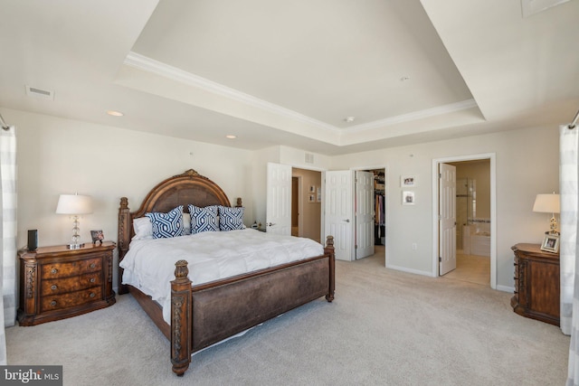 bedroom featuring light carpet, visible vents, a raised ceiling, and ornamental molding