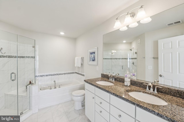 bathroom featuring a sink, visible vents, a garden tub, and a stall shower