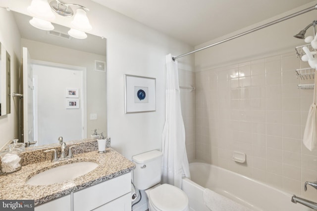 bathroom with vanity, toilet, shower / bathtub combination with curtain, and visible vents