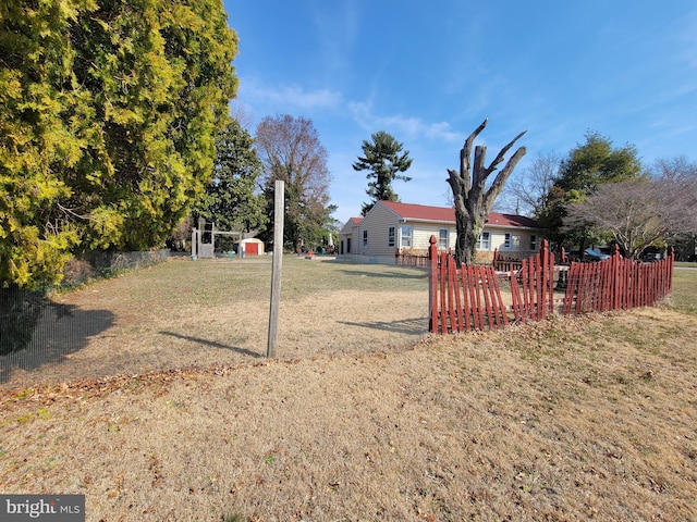 view of yard with fence