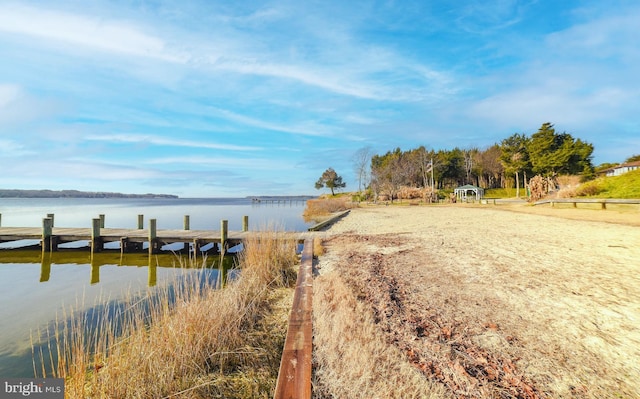 dock area featuring a water view