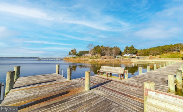 view of dock with a water view