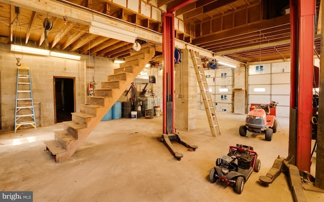 below grade area with stairway and a garage