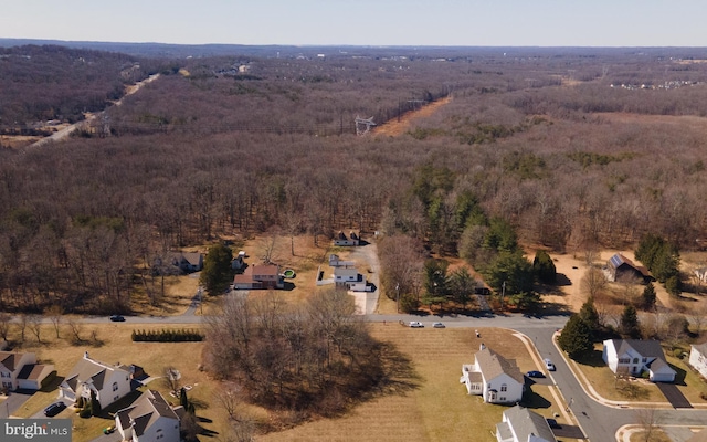 bird's eye view with a view of trees