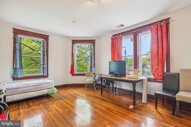 office featuring visible vents, baseboards, and hardwood / wood-style floors