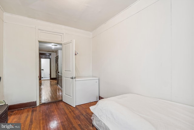 bedroom featuring hardwood / wood-style floors