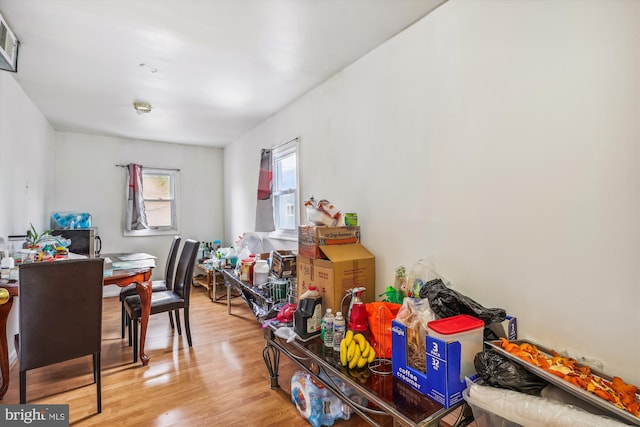 dining room featuring visible vents and wood finished floors