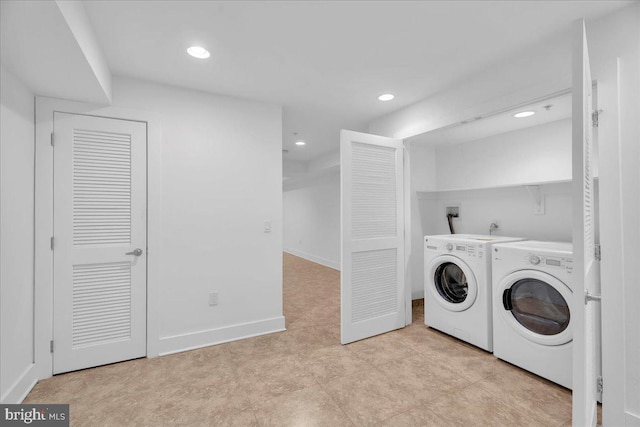 laundry room with washing machine and clothes dryer, laundry area, recessed lighting, and baseboards