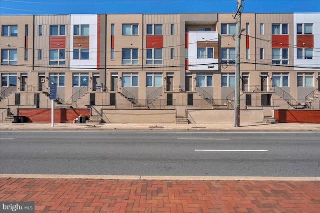 view of building exterior with a residential view