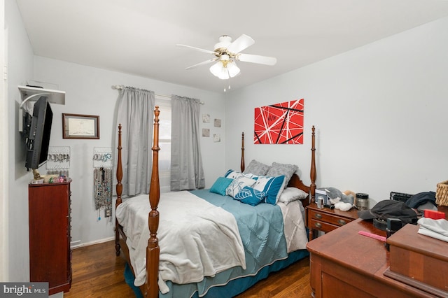 bedroom with ceiling fan and wood finished floors