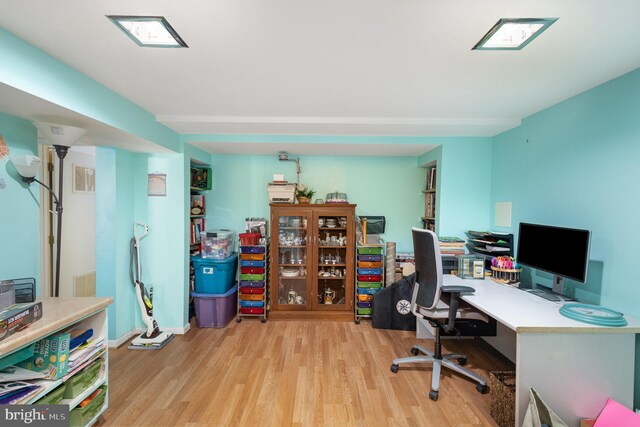 office space featuring wood finished floors