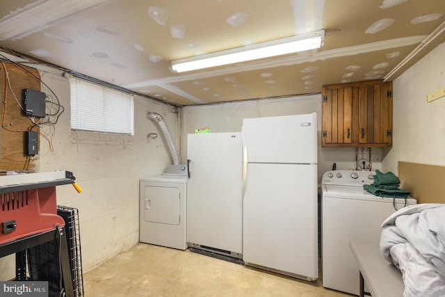 laundry room with cabinet space and independent washer and dryer