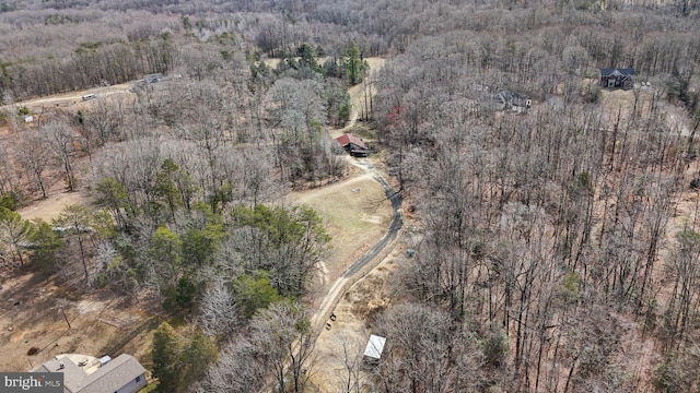 drone / aerial view with a forest view