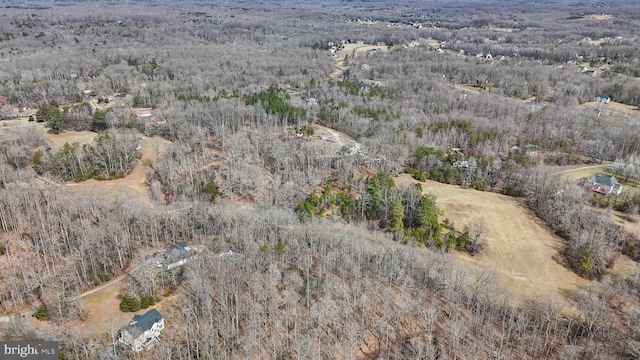 aerial view featuring a view of trees