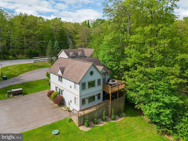 drone / aerial view with a forest view