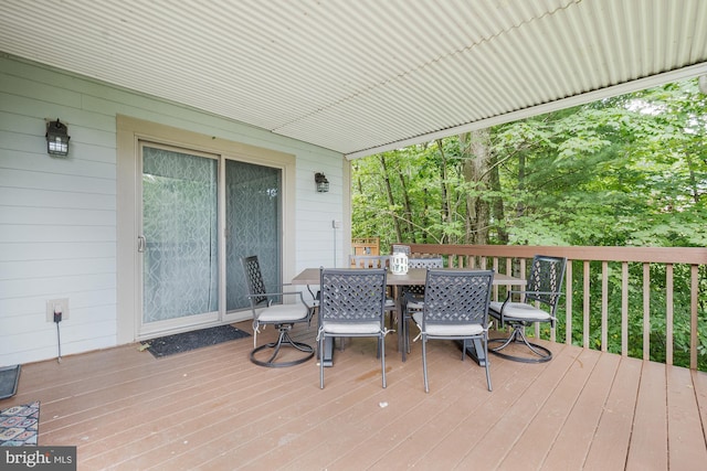 deck featuring outdoor dining space