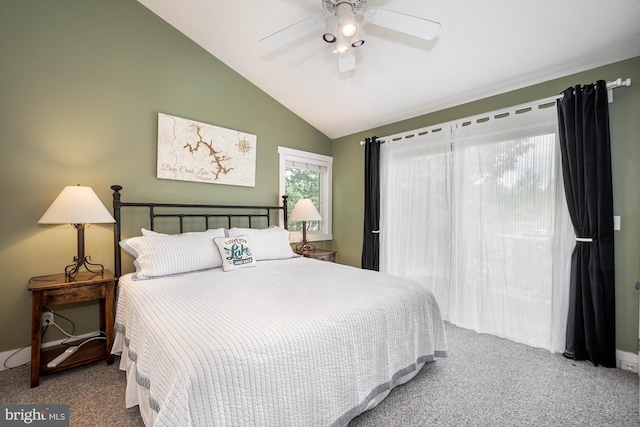 bedroom featuring lofted ceiling, carpet flooring, and ceiling fan