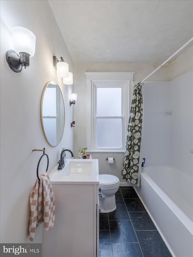 full bathroom featuring vanity, toilet, shower / tub combo, and plenty of natural light